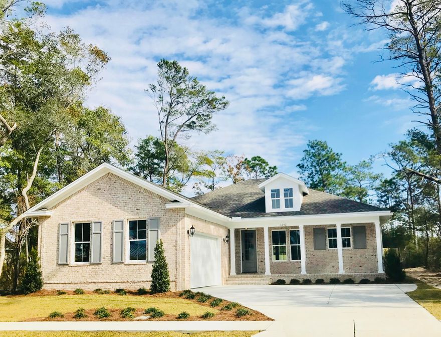 Move in ready! A new high end brick traditional one story home in Deer Moss Creek, Niceville's Newest Community. Open floor plan, foyer, breakfast room, split floor plan, front and back porch, side entry 2 car garage, impact windows and insulated doors. The kitchen features stainless appliances with refrigerator, oven dual-fuel, dishwasher, microwave, two sinks and a kitchen island with granite countertops. Luxury vinyl plank flooring in the social areas and 1 bedroom. Carpet in the other two bedrooms and many more extras. A must see!!