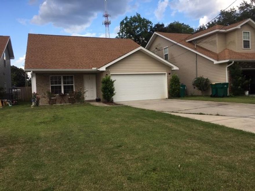 This home offers a spacious open floor plan with living room and dining area combination. The kitchen features granite countertops, back splash, and stainless steel appliances (ice maker not warranted). Tile flooring throughout and carpet in bedrooms. Primary bedroom is located downstairs. Primary bathroom features double vanities, large tub, and shower. The upstairs features four additional well sized bedrooms! This home also has an oversized driveway, and a backyard with a covered patio! Home is located minutes from Eglin AFB, and about 10 minutes to Hurlburt Field and the beautiful beaches of the Emerald Coast! Owner will consider a pet (with approval) with a nonrefundable pet fee. Any pet must be spayed/neutered, current on all shots and housebroken. Renters liability insurance is required. Everyone over the age of 18 must fill out separate application and be named on the lease.