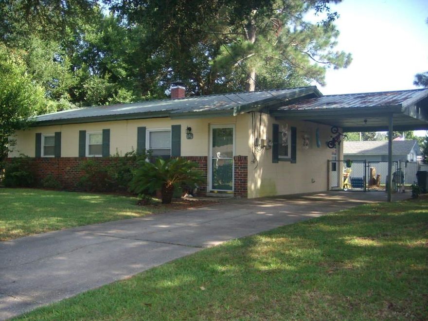 WELL KEPT HOME IN CONVENIENT & ESTABLISHED AREA. TILE FLOORS THROUGHOUT FOR EASY CARE. 2 YEAR OLD METAL ROOF. FULLY EQUIPPED KITCHEN WITH NEW COUNTERTOP. REFRIGERATOR WORKS WELL BUT STAYS IN ''AS IS'' CONDITION. FENCED BACK YARD. ACCESS FROM CARPORT THROUGH UTILITY AREA TO HOUSE. SECURITY DEPOSIT INCLUDES NONREFUNDABLE FLOOR CLEANING AND PEST CONTROL FEE. CREDIT CHECK IS $25 PER ADULT.