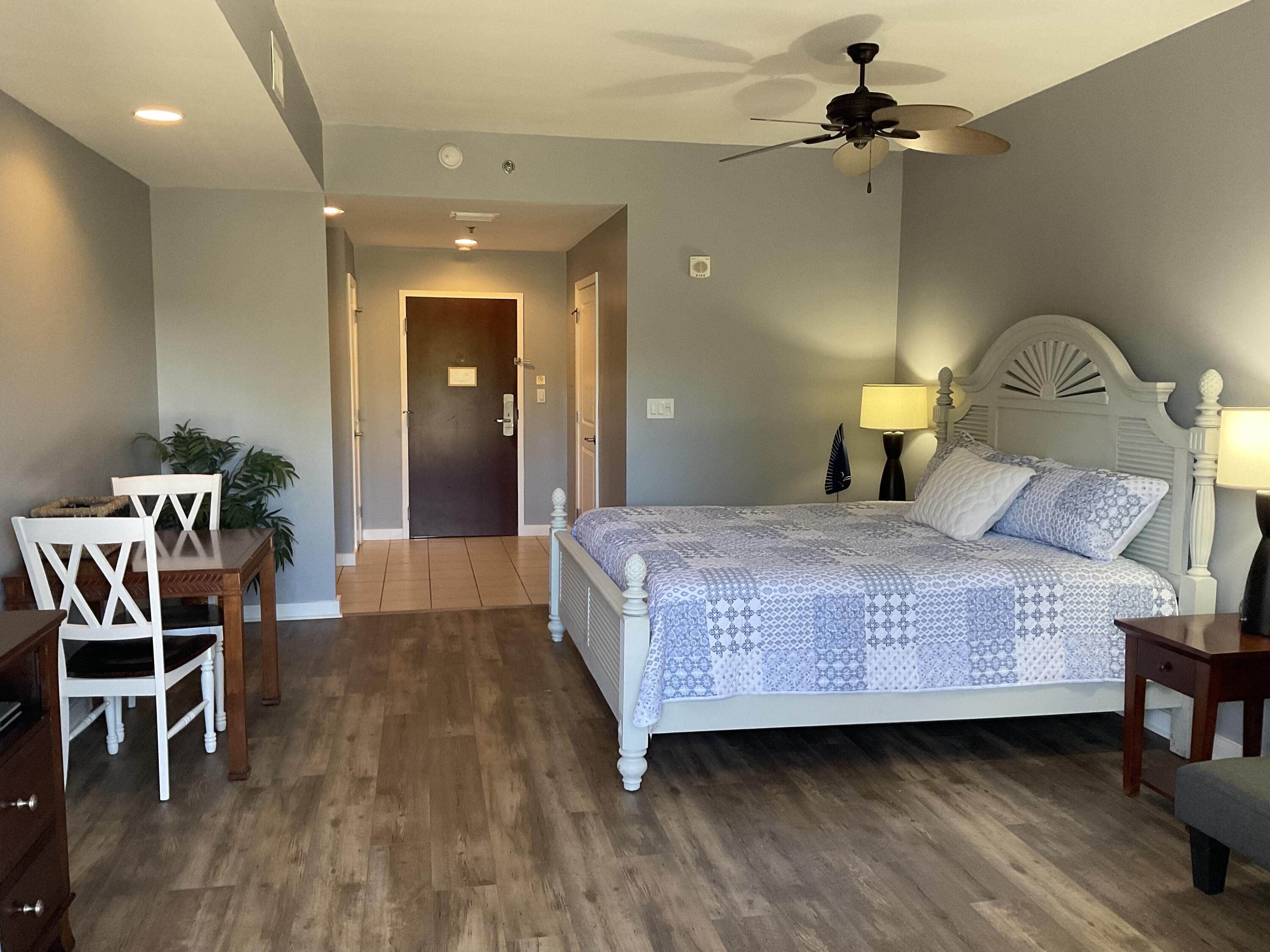 Updates Complete in this Luau Studio Condo! Do you want Beach or Pool? Luau has arguably the best pool in Sandestin - and the beach is only about 100 yards away.  This ground floor studio offers a king size bed and a loveseat that converts to a twin bed to accommodate extra guests. You will also appreciate the kitchenette with mini-fridge, microwave, toaster, and sink.  Open the sliding doors to the spacious, private patio and direct access to the pergola covered grilling area. The lagoon-style pool with waterfall,  baby pool, and hot tub; the seasonal Tiki Hut on the pool deck; and the fitness center are all easily accessible from Unit 6125.  Exit your unit into the hallway and walk around the corner to the fitness center.  Exit through the lobby and you're