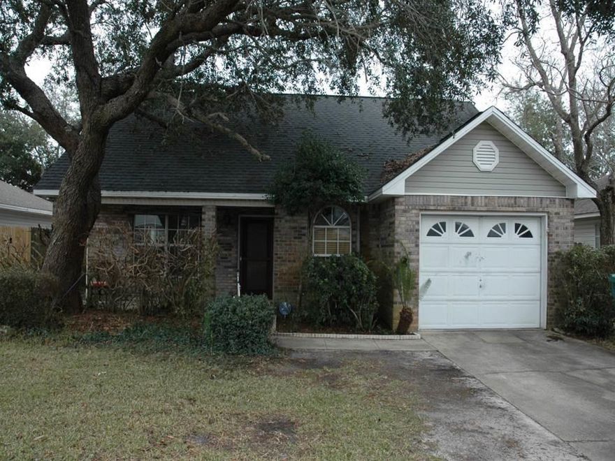 Great 3 bedroom 2.5 bath two story home in the heart of Destin. Convenient to just about everything. Features downstairs master, open living/dining area, one car garage, fenced backyard and priced to sell. Needs a little TLC which is reflected in the price. Great for primary residence or investment rental. Hurry hurry hurry!
