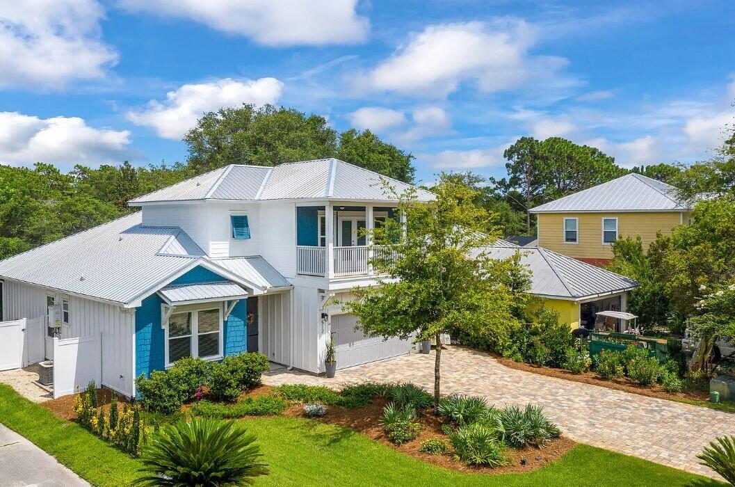 Welcome to paradise! Stunning cottage style home located on a quiet cul de sac at desirable 30A. Walking distance to Alys Beach! The community features a deeded beach access with golf cart parking and gated entry. This one-of-a-kind home sits on a large lot and boasts 2,049 square feet of living space. Upon entering the large double front doors you will find TWO ground floor bedrooms, including a ground floor master suite complete with a double vanity, free standing soaker tub, walk-in shower, and walk-in closet with built-in stackable washer and dryer. Open great room with recessed lighting and tall ceilings. dry bar with icemaker and wine cooler, oversized island, gas range, walk-in pantry, and custom cabinetry are just some of the many features you will find inside this beautiful home.