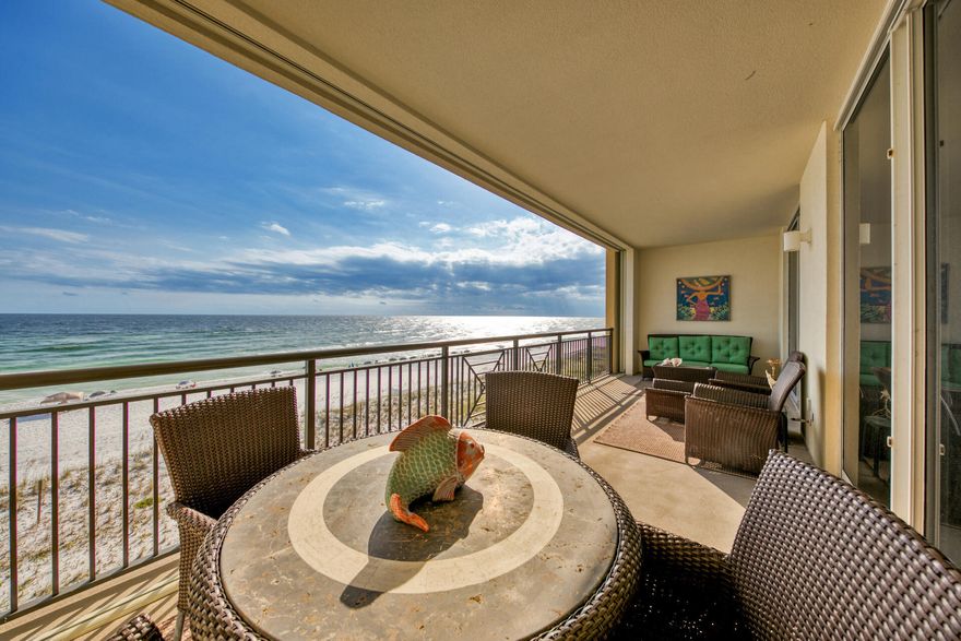 This gorgeous unit features an expansive private balcony and boast luxurious finishes such as travertine floors with plush carpet in the bedrooms, crown molding granite countertops, and stainless steel Viking appliances, Full size washer and dryer are included