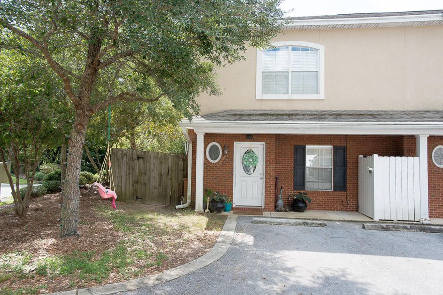 Beautiful End Unit Townhome in the heart of Niceville. Spacious 3 Bedroom, 2.5 Bath floor plan with Large Kitchen featuring breakfast bar, granite counters, and tons of cabinets. 10 x 50 Fenced in back yard with large stepped deck overlooking natural creek area. Hardwood Flooring Upstairs and Tile downstairs. Pets allowed upon approval with $300 non refundable pet fee.