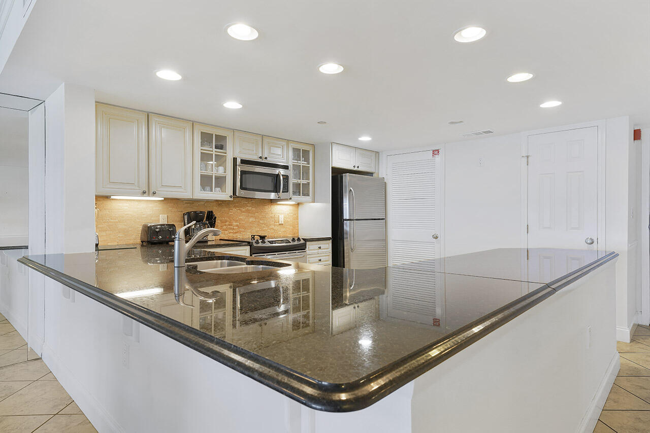 BREAKERS EAST CONDO - Residential