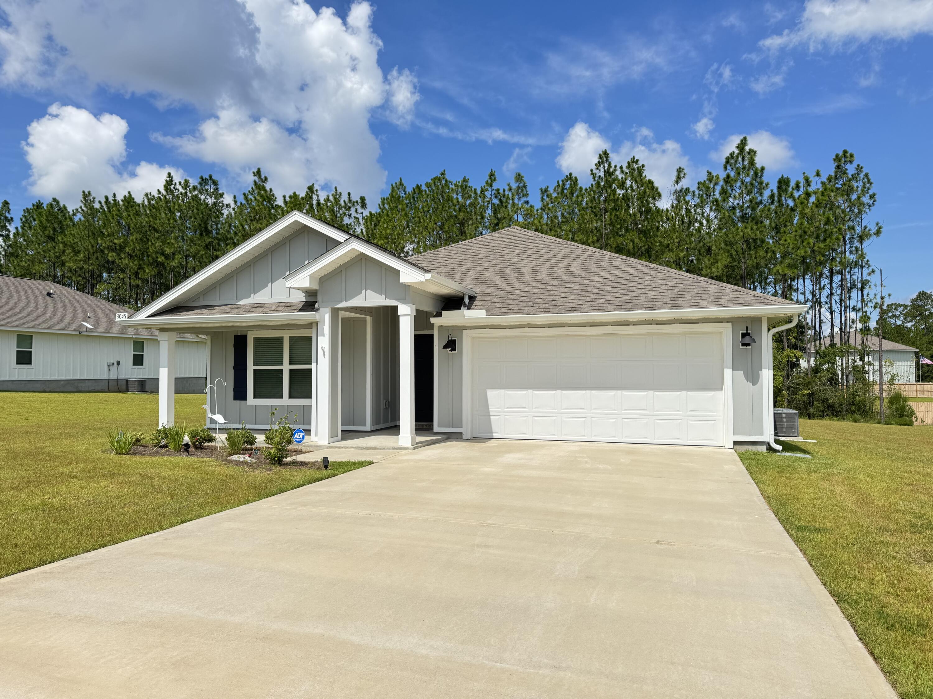 Built in 2023 & used as a second home, this one is truly like-new, this home has been meticulously maintained, the owner just added new gutters this year and this one has both front and back covered porches. Inside, the open, split-bedroom floor plan has a spacious living area, crisp white cabinetry, and a large kitchen island - perfect layout for entertaining or everyday living. Modern upgrades include a Smart Home Connect system, whole-home water softener, air purifier & a tankless gas water heater, delivering convenience, cleaner air and water, and endless hot water on demand. The primary suite offers a double vanity, low threshold shower, water closet, & large walk-in closet. A huge half-acre lot in Laurel Hill - just north of Crestview awaits! Seller credit up to $10,000!!