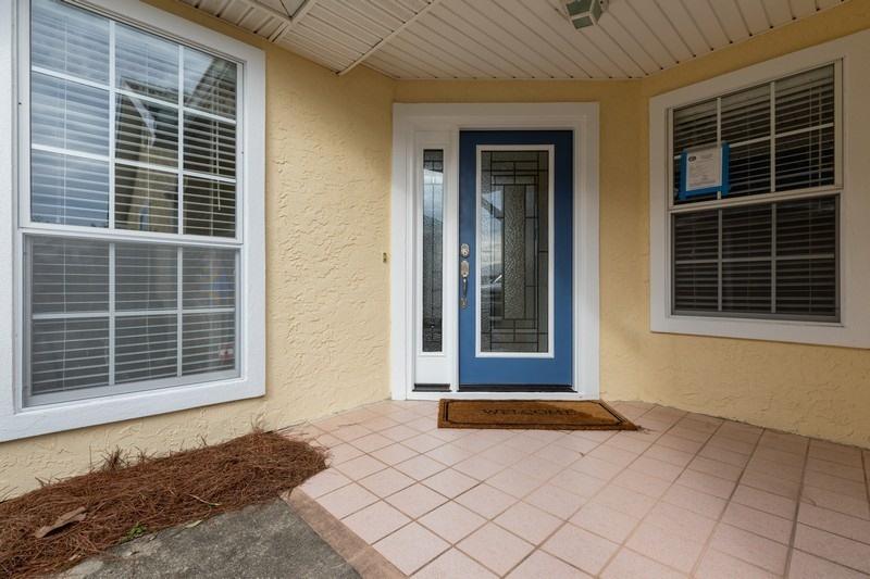 A beautiful townhome in the Panama City Country Club, is move in ready with hardwood and tile throughout. The great room boosts a vaulted ceiling with french doors leading to the secluded back patio. The home backs to the 6th fairway to the prestigious Panama City Country Club golf course. The updated kitchen with white cabinets overlooks the spacious dining area and great room making it perfect for entertaining. The roof was replaced in 2019. This home has been freshly painted. This 3 bedroom, 3 bathrooms, with a private outdoor living space is ready for its new owner.