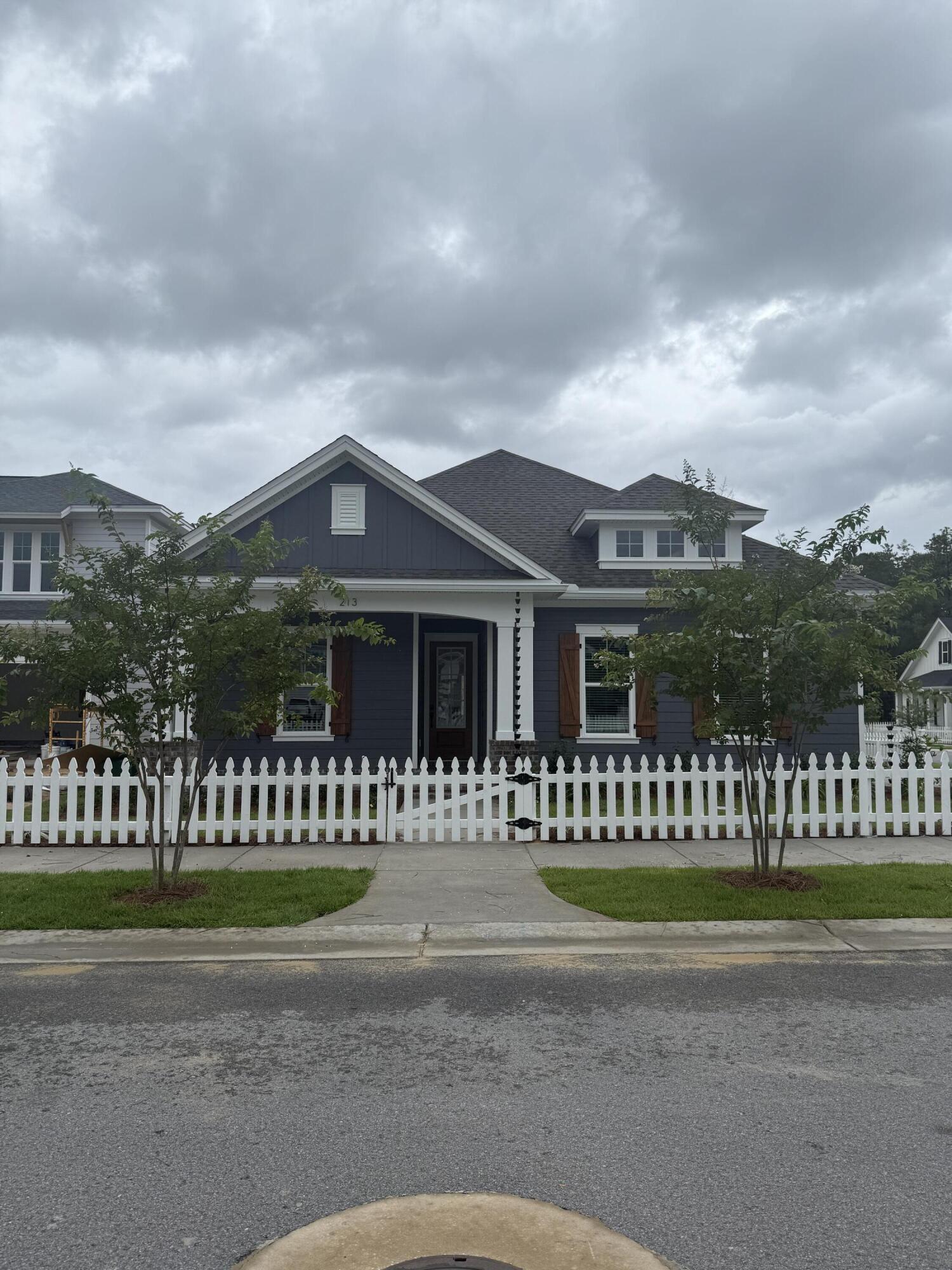Welcome to the NEW Dogwood Plan, a highly sought-after, true one-story floorpan in Phase 7 of Deer Moss Creek--the first of its kind in this phase! This 2000 sq. ft., 4-bedroom, 2-bathroom home with a 2-car garage is perfectly situated on a desirable corner lot. The exterior features warm, inviting tones that complement the home's classic design, with beautiful stained shutters adding a touch of charm and character.Step inside, and you'll be greeted by a cozy foyer that opens into an expansive open-concept living, kitchen, and dining area--ideal for modern living and entertaining. The kitchen boasts quartz countertops, shaker-style cabinets, and a large island, making it both functional and stylish. Fully cased windows throughout add to the elegance. The living area seamlessly transitions to the covered back porch, where you can grill, relax, and enjoy the fresh air in your privately fenced 8ft backyard, a perfect retreat for unwinding. This home boasts vinyl, low E, Impact windows for added peace of mind.
As part of the master-planned community of Deer Moss Creek, this home offers access to a wealth of amenities, including a community pool, clubhouse, basketball court, playground, gazebos, and scenic walking trails.
If you've been searching for a spacious, one-story home in a vibrant community with ample amenities, this Dogwood Plan is the perfect choice for you. Don't miss your chance to make it yours!
Estimated completion of this home is July. Builder will presell. Many interior selections are still available to make it your own.
