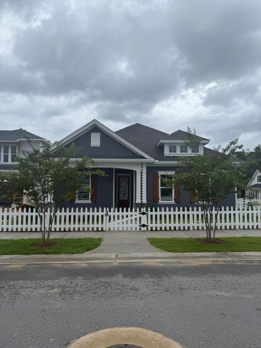 Welcome to the NEW Dogwood Plan, a highly sought-after, true one-story floorpan  in Phase 7 of Deer Moss Creek--the first of its kind in this phase! This 2000 sq. ft., 4-bedroom, 2-bathroom home with a 2-car garage is perfectly situated on a desirable corner lot. The exterior features warm, inviting tones that complement the home's classic design, with beautiful stained shutters adding a touch of charm and character.Step inside, and you'll be greeted by a cozy foyer that opens into an expansive open-concept living, kitchen, and dining area--ideal for modern living and entertaining. The kitchen boasts quartz countertops, shaker-style cabinets, and a large island, making it both functional and stylish. Fully cased windows throughout add to the elegance. The living area seamlessly transitions to the covered back porch, where you can grill, relax, and enjoy the fresh air in your privately fenced 8ft backyard, a perfect retreat for unwinding. This home boasts vinyl, low E, Impact windows for added peace of mind. 
As part of the master-planned community of Deer Moss Creek, this home offers access to a wealth of amenities, including a community pool, clubhouse, basketball court, playground, gazebos, and scenic walking trails. 
If you've been searching for a spacious, one-story home in a vibrant community with ample amenities, this Dogwood Plan is the perfect choice for you. Don't miss your chance to make it yours!

Estimated completion of this home is July. Builder will presell. Many interior selections are still available to make it your own.

