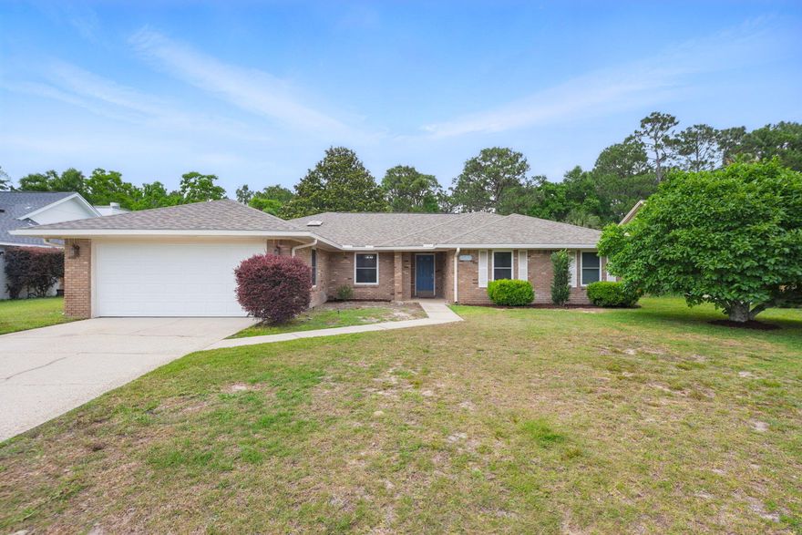 *PRESENTED WITH STAGING FURNITURE* Welcome to 840 Overbrook Drive, a charming home in the welcoming Overbrook neighborhood. Perfectly situated for those stationed at Hurlburt Field or Eglin AFB, this location offers convenience for Active Duty and DOD personnel. Fort Walton Beach is a vibrant area with plenty to offer, from the stunning emerald beaches of Okaloosa Island and Destin to lively downtown nightlife, as well as numerous parks, shopping, and dining options.Step inside to find a spacious living area featuring vaulted ceilings and a cozy brick fireplace. The elegant laminate hardwood flooring adds warmth to the home. The kitchen includes granite countertops, a handy kitchen island, and a breakfast nook. You'll also find a pantry cabinet for extra storage and a formal dining room for those special meals.
The primary bedroom is a private haven with direct access to the backyard. It features a double vanity, a separate jetted bathtub, a glass door walk-in shower, and a large walk-in closet. The split bedroom floorplan provides privacy and plenty of storage throughout the home.
Enjoy outdoor living in the enclosed back patio or the spacious fenced yard, ideal for gatherings or relaxation. Recent updates include a new roof in 2024, fresh interior paint, and select updated light fixtures, ceiling fans, switches, and outlets in May 2025. Schedule your private showing today! 
