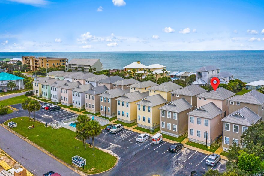 Enjoy gulf views from the 2nd and 3rd story balconies of this stunning Florida cottage, located on the north side of 30A.  This 4 bedroom, 4 bathroom home invites your in to a main level with a master bedroom along with a guest bed and bath. On the second story you will enjoy and open concept kitchen and living area fully equipped with a breakfast bar and build in ice maker.  The third bedroom and bath are also located on the spacious second floor.  As you enter the 3rd story, you will find another private master suite with stunning views of the Emerald Coast. This home is moments from Alys, Seacrest and Rosemary Beaches. There is a beach access directly across the street.This property has been on the rental program with established history.  Great investment opportunity ON 30A