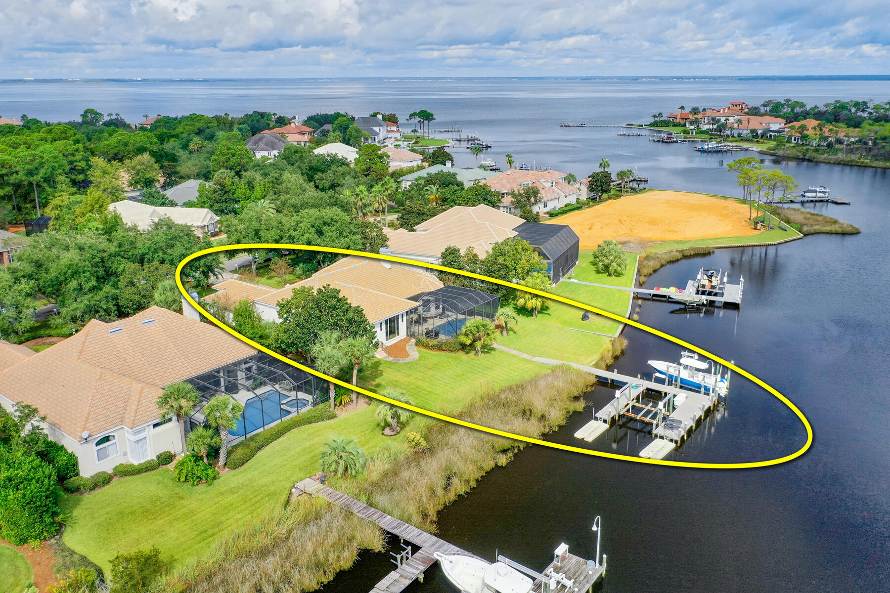 JUST REDUCED! Fantastic, furnished opportunity to own and enjoy the lifestyle of this fabulous waterfront estate situated beautifully on scenic Jones Bayou in the master-planned, gated community of Kelly Plantation, which offers many amenities along with the perfect mid-Destin location for enjoying the best of Florida's Emerald Coast! The one-story floorplan is perfect for those who want the convenience of its functionality and livability! The existing dock steps from the wonderful pool will allow one to capture the essence of the outdoor lifestyle of Florida and the gorgeous waters of Destin and the Gulf of Mexico! The remodeled, spacious kitchen features Cambria countertops, a large island, walk-in pantry, breakfast bar, wolf appliances and subzero appliances...