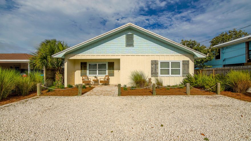 This stunning single-family residence offers thoughtfully designed living space and comes fully furnished. Ideal as a full-time residence or second home, this property provides comfort, style, and functionality in every room. And just one block to the white sandy beach, it's perfect location to live the PCB life. Enjoy 2 oversized bedrooms and 2 full bathrooms, each with large walk-in showers and sleek tempered glass vessel sinks that bring a touch of luxury to your everyday routine. The kitchen features upgraded stainless steel appliances and custom finishes, while the open-concept layout makes entertaining a breeze.Additional highlights include custom floating shades throughout, a full-size laundry area with washer and dryer , and a detached 1-car garage for extra storage and convenience.

This home is perfect for those looking for a serene second home, beautifully maintained primary residence, or long term rental investment.. Schedule your private showing today!