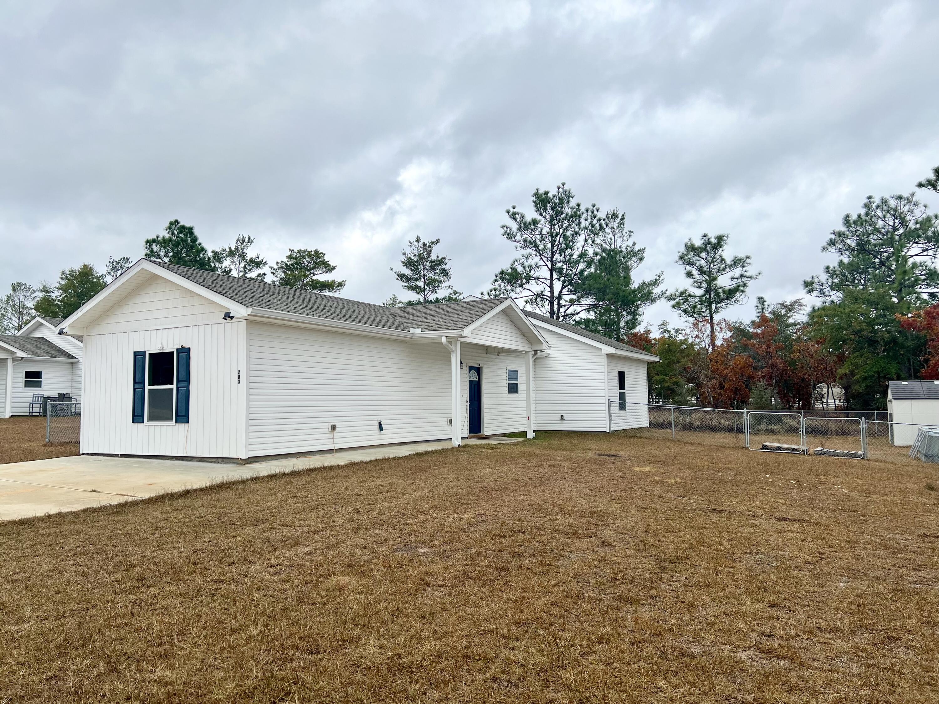 3 bedroom, 2.5 bath home with split floor plan! Kitchen features electric stove, refrigerator, microwave, dishwasher, lots of cabinets and granite countertops space and a breakfast bar! The primary bedroom is nice sized, with a large closet and has its own full bath. The two additional bedrooms are also nice sized with large closets. Each bedroom has its own sink and toilet area while sharing a tub/shower. LVP flooring throughout this hope as well. There is an electric fireplace in the large living room and the back door leads to the fully fenced backyard. The backyard has a nice storage building and an above ground pool (can be removed if not desired). Large concrete driveway and sprinkler system.