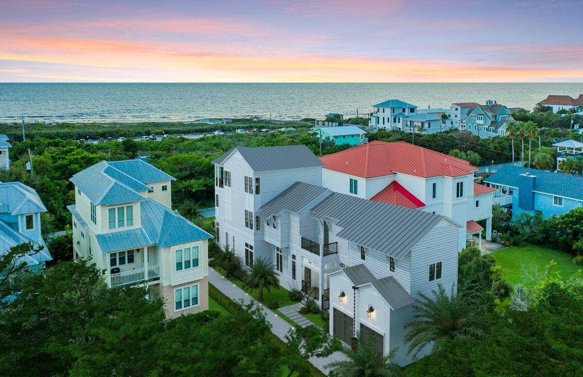 Primely located in the emerging neighborhood of Pompano Place in the heart of Inlet Beach, this exceptional turn key property offers beautiful gulf views & exceptional architectural styling with an impressive three story vertical footprint and well amenitized including a private pool, spacious two car garage and steps away from exceptional beach access. This prominent new construction by BetterBuilt of Northwest Florida has been thoughtfully curated to maximize space and embrace an open living floor plan yielding 4,038 sqft of heated living space including five well appointed bedroom suites including a kid's bunk room.