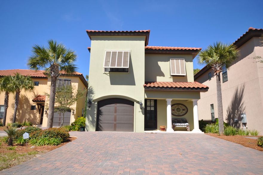 Back on market! FULL CAR GARAGE on Cul De Sac with extra wide Driveway, Large lot featuring wood floors throughout with tile in all bathrooms, crown molding, stainless steel appliances, large walk-in pantry, limestone porches with screened-in porch downstairs. Each bedroom has private bath and walk-in closet. This home has a contemporary flair with a curved entryway. Built in speakers in family room and master bedroom, wired for security system. Located on the 5th hole of Baytowne Golf Course. Home sealed and painted with BASF Elastomeric coating. Villa Lago is located inside the exclusive Sandestin Golf and Beach Resort, walking distance to Baytowne Wharf and one of the most sought after neighborhoods in the Resort.