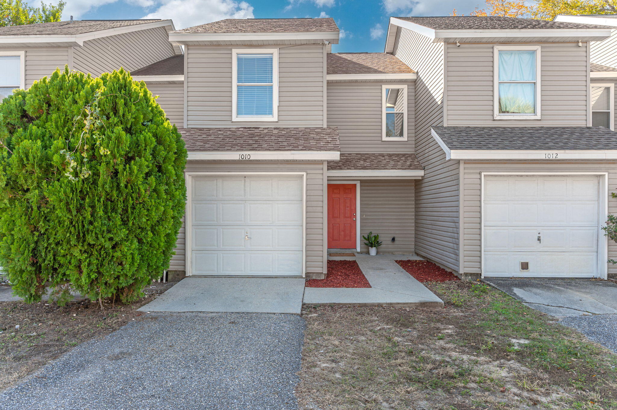 Welcome to this charming 2-bedroom, 3-bathroom townhome located in the heart of Fort Walton Beach! Offering a comfortable, spacious layout with modern updates, this home is perfect for both relaxing and entertaining. As you enter, you'll be greeted by an open and inviting living room and dining room area, perfect for gatherings or quiet evenings at home. A cozy fireplace adds charm and warmth to the space. The kitchen is well-appointed with all major appliances and a pantry for extra storage, and a breakfast bar provides additional seating and convenience. New carpeting has been installed on the stairs and throughout the entire second floor, adding a fresh and cozy feel to the bedrooms. Each of the two spacious bedrooms boasts its own full bathroom, providing plenty of privacy and comfort