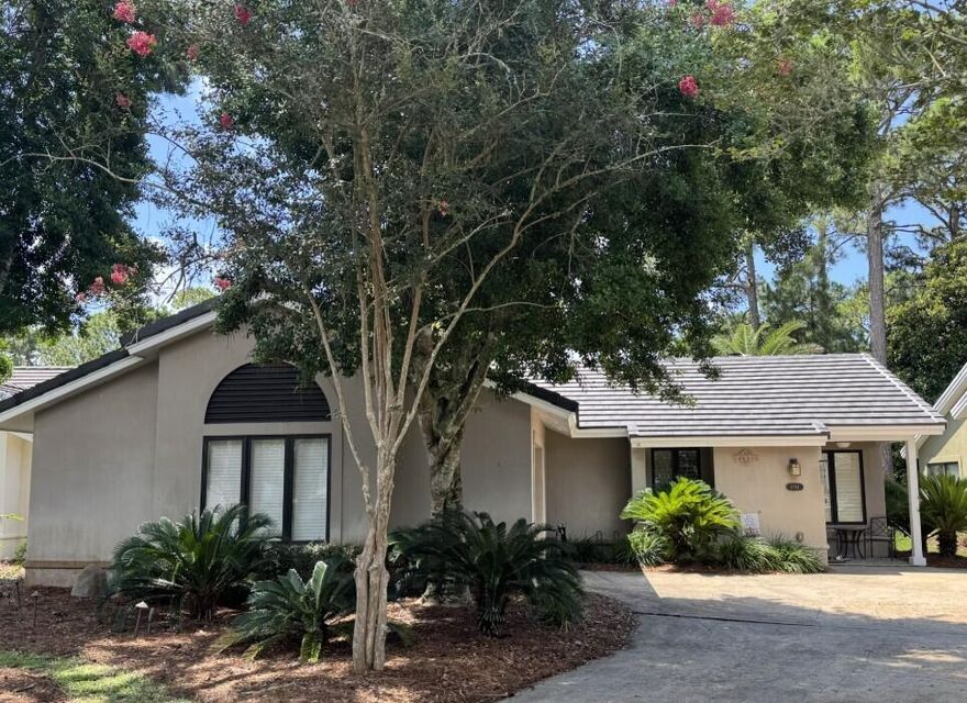 MOTIVATED SELLER! This is your opportunity to get an AMAZING PRICE in the highly sought-after St Andrews Community in Sandestin Golf & Beach Resort! LOCATION! This home sits on St Andrews' largest lot with 35 feet along the Lakeside on the 10th hole of the Baytowne Golf Course. Enjoy the spacious and private backyard (large enough for a pool) with tranquil views of the lake and the sounds of the shimmering fountain and newly planted citrus trees. Entertain on the large deck featuring a fire pit and Grill with a Gas line connection. Vaulted ceilings and an enclosed sun room add additional space and sunlight to the home. Recent updates include a concrete tile roof 2023, Hot water heater 2019, HVAC system 2020. Kitchen includes  stainless appliance The attached garage has a storage closet. The newly remodeled Sandestin Pool Pavilion is located across the street. HOA includes landscaping and Basic Cable and trash collection. Stroll down the oak tree-lined sidewalk and you will find several nature paths, the Marina complete with patio restaurant, boat, paddleboard, jet ski, fishing and bike rentals. Next door is the Tennis center to include 6 Pickleball courts. Take the Marina Path to the Baytowne Village filled with Dining, Shopping, and Entertainment choices. Sandestin is a true Golf Cart Resort Community, featuring more than seven miles of beaches and pristine bay front, four championship golf courses, 15 world-class tennis courts, a 226-slip marina, with boat, jet-ski, and paddleboard rentals. A fitness center, spa, and celebrity chef dining. Shopping, Dining, and fun for all ages during the summer months at the Baytowne Village with entertainment Tuesday-Thursday evenings. Sandestin residents enjoy a lifestyle of upscale living, spanning the 2,400 acres from the beach to the bay. Everything within the resort is accessible by golf cart or bicycle. The entire resort is interconnected by miles of pedestrian, bike, and golf cart paths that weave through groves of live oaks, meandering past natural lagoons, fountains, man-made lakes, and meticulously landscaped fairways.