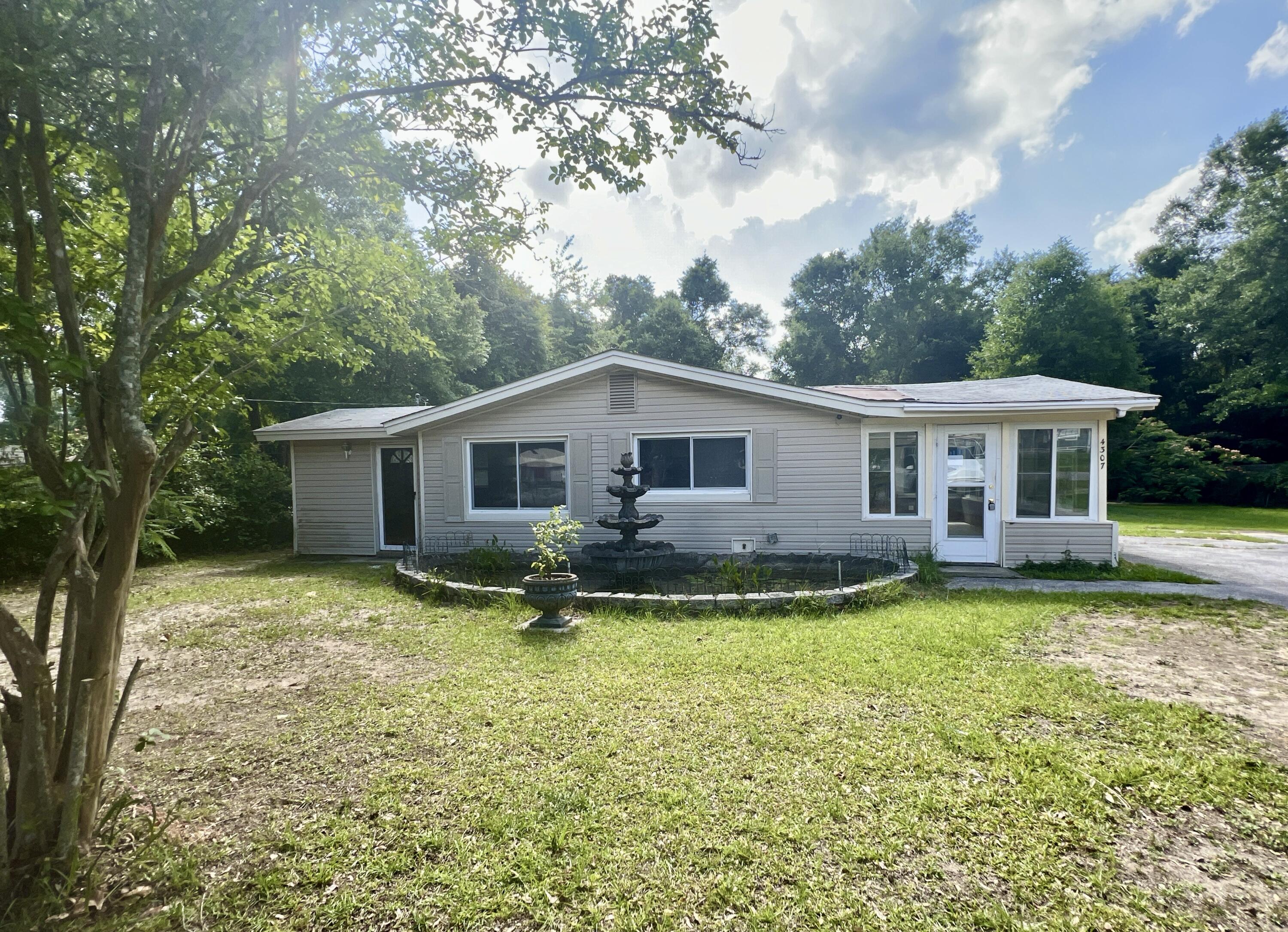 Located in the heart of Pace and in an established community, this REO is one to see. This block home has vinyl siding, an enclosed patio, completely fenced yard and was built in 1958. Home is just under 1000sf, has 2 bedrooms and 1 full bath. Located on approximately .3 acres, this super cute home definitely deserves a look if looking for the next rental or your first home. There are many financing options for this home, regardless of condition or any repairs that may be needed. This home is only open to owner occupants for the 1st 30 days on the market. Call today before this one is gone.