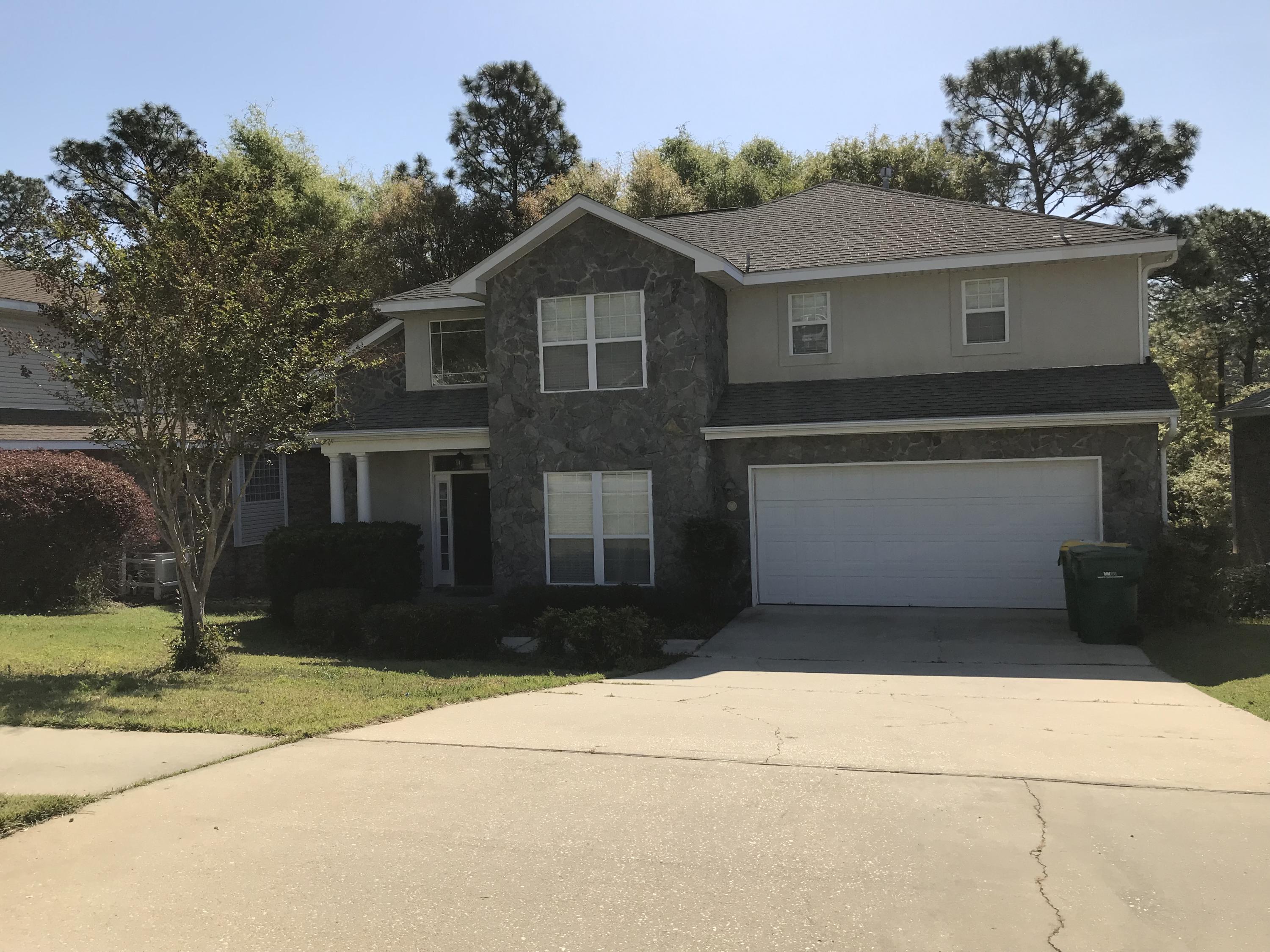 Fantastic Niceville home that checks all your boxes! Priced to sell, this 4 bedroom, 3 full bath home is located in the quiet subdivision of Woodridge. Location is everything for this fantastic family home minutes to Twin Cities hospital, Eglin AFB, Duke Field, Niceville schools, and the beaches of Destin! In this well maintained home you'll find tile flooring in the foyer and wet areas, hard wood flooring in the dining area, and carpet flooring in the living areas. The kitchen boasts BRAND NEW stainless steel appliances and gorgeous granite counter tops with an under mounted stainless steel sink and a new faucet!! In addition to the dining room and kitchen, the first floor features an oversized great room (with gas fireplace), eat-in kitchen area with an added breakfast bar space,