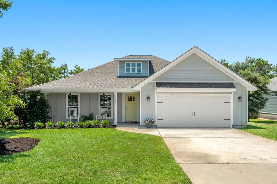 Welcome to this beautifully designed 3-bedroom, 2-bathroom home in the heart of Gulf Breeze, custom-built in 2018 and offering 1,805 square feet of thoughtfully crafted living space. Nestled just 0.7 miles from the Woodlawn Beach boat launch and only 3.7 miles from the serene Soundside Foundation Nature Preserve, this home offers the perfect balance of comfort, convenience, and coastal living.Step inside to an inviting open-concept living area featuring elegant wainscoting, an electric fireplace, and oversized windows that fill the space with natural light and offer charming views of the front yard and garden. The chef's kitchen is a standout with granite countertops, shaker cabinets, stainless steel appliances, and a classic subway tile backsplash. A separate office space near the back door provides the perfect spot to work from home, with a lovely view of the garden's orange tree.  The spacious screened-in back porch is ideal for relaxing or entertaining. The large, fenced backyard includes a firepit and garden area, creating your own private outdoor oasis.

Throughout the home, you'll find durable and stylish LVP and tile flooring, along with a dedicated laundry room and generously sized bedrooms. The luxurious primary suite boasts a tray ceiling with chandelier, two large windows overlooking the backyard, and a spa-like en-suite bath featuring a dual vanity, soaking tub, separate shower, and a roomy walk-in closet.

Additional highlights include a 2-car garage with pull-down stairs leading to a large attic for extra storage, a well-fed sprinkler system, and a beautiful neighborhood setting. Located 0.9 miles from Woodlawn Beach Middle School and just 1.2 miles from the upcoming Soundside High School, this home is perfectly situated for families.

Only 10 minutes to Navarre Beach and 24 minutes to downtown Pensacola, you're never far from a day on the water, local dining, shopping, and entertainment.

Don't miss your chance to own this exceptional Gulf Breeze gem. schedule your private showing today!