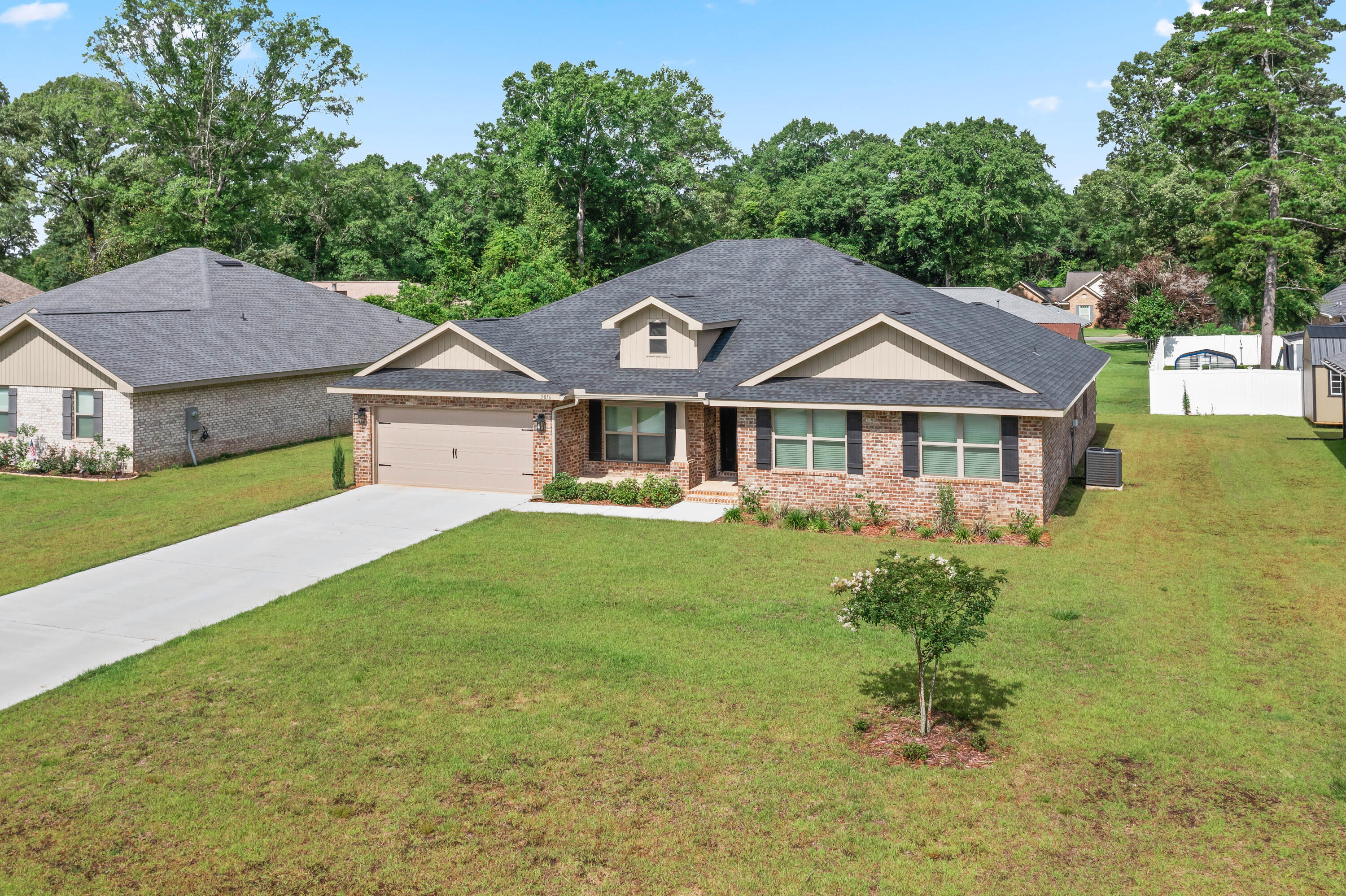 ***Seller now offering a 2/1 interest rate buydown and will pay buyer's closing costs--making this home an even smarter buy! Plus, other buyer incentives available. Restrictions apply. Almost new. Open floorplan. 4 BR - 3 BA. Kithen upgraded with granite. Large breakfast nook as well as a formal dining room with a tray ceiling. Pantry is extra large as well as the laundry room with granite top folding table. Floors upgraded with core tec proplus everywhere but bedrooms which are carpeted. Patio is covered and screened and can be accessed through great room or laundry room. Exterior is 4 sided brick, garage has wifi door opener. The property is