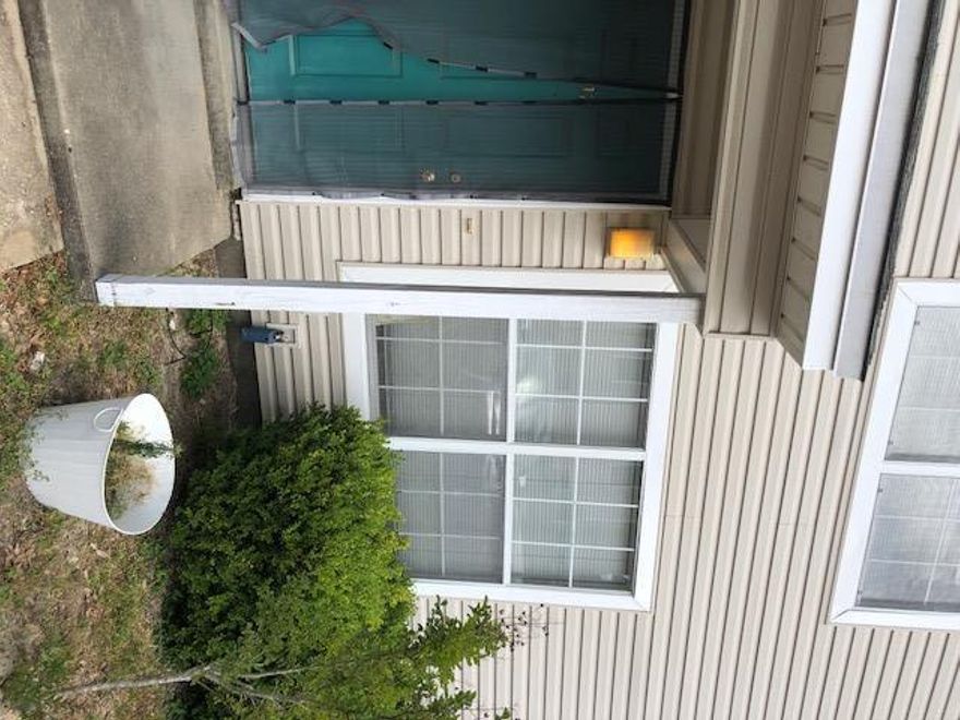 **AS-IS** Tucked away in a quiet neighborhood, this unit offers a 2 bedroom floor plan with 1 full bath on the second floor plus a half bath on the first floor to service the living area. This townhome offers a spacious kitchen with 2 pantry's, washer and dryer hookups and a sliding glass door off of the kitchen that leads to a fenced backyard. This property is centrally located between both Military bases, several shopping centers and a short trip to the beaches. Being Sold**AS-IS**