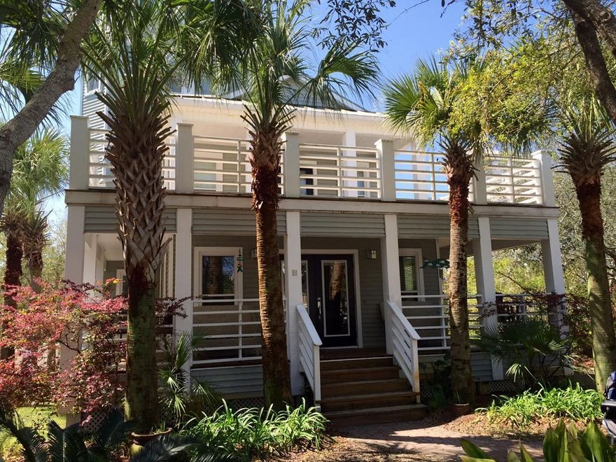 Southern Comfort are two perfect words to describe this recently refreshed, well-maintained 3 bedroom, 2 bath Florida Cottage located 1 block to private deeded beach access on the white sandy beaches of the Gulf of Mexico. Relax on the wrap around front porch and take in the majestic Live Oak trees. This home is currently an income producing vacation rental consistently generating over $58,000 annually in gross rental income and booked solid through June-August 2016, however this home is built to accommodate the needs of full time living. Lifetime warranty on hurricane rated windows, maximum storage 4 separate (climate controlled in-between the second and third floor) foam insulation in attic and under home for maximum comfort. First floor features an open floor plan with the kitchen,