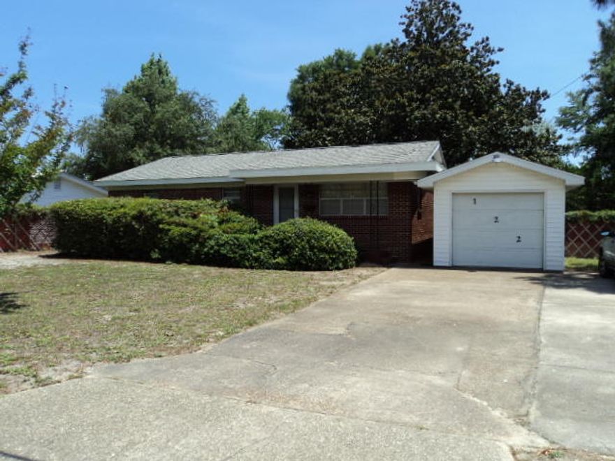 Good bones in this 1955 all brick home in great established neighborhood. Over 1500 square feet of living space with 2 full baths and 3 bedrooms, each with oversized closets that are a rare find in older homes. Enjoy the addition of the large family room and ample inside laundry room. Sliding door leads out to an oversized concrete patio. The large backyard boasts an awesome Magnolia tree with a perfectly positioned limb just waiting for a bench swing. Newer AC and HW heater as well as dimensional roof in '05. Vinyl soffits for easy maintenance. Backyard is fenced and includes a nice storage building. The Detached garage keeps you out of the weather and the driveway offers parking for 6.With some updating this could again be a great family home convenient to schools, parks and shopping