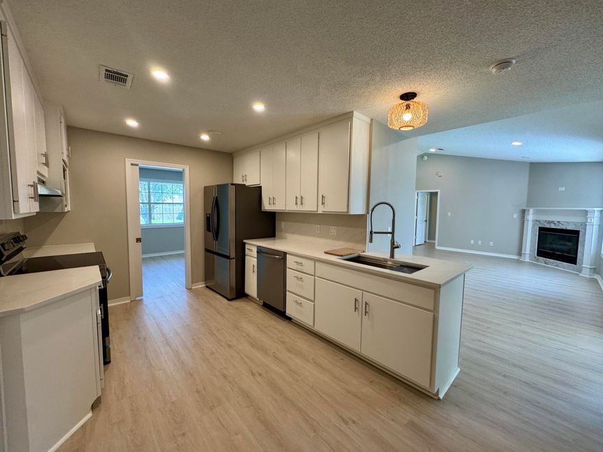 Beautiful Lakefront Home in Lake Charlene East! A short commute to Pensacola NAS, this spacious brick home offers 4 bedrooms, 2.5 baths, and 2,423 sq. ft. of comfortable living. Nestled in a peaceful community on a picturesque lakefront lot, it's the perfect blend of convenience and tranquility. Inside, you'll find an airy, open floor plan with a cozy fireplace, a bright kitchen, a formal dining room, and dedicated office space. The climate-controlled Florida room provides year-round enjoyment with relaxing lake views. Dogs upon approval, no smoking, no vaping.