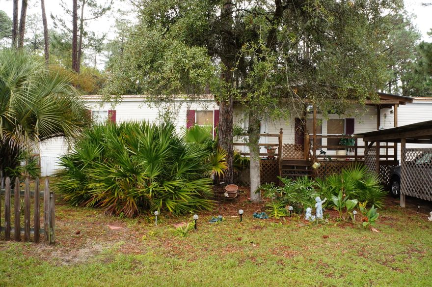 The mobile home is in very good condition, with many recent upgrades and replacements: roof/2012; laminate floors/2011; carpet/2014; vinyl/2014. The property is in a great location, near the hospital, Walmart, Publix, lots of shopping, and the beach. The large back yard is fenced, with two storage sheds. You can't live on the Emerald Coast for less!