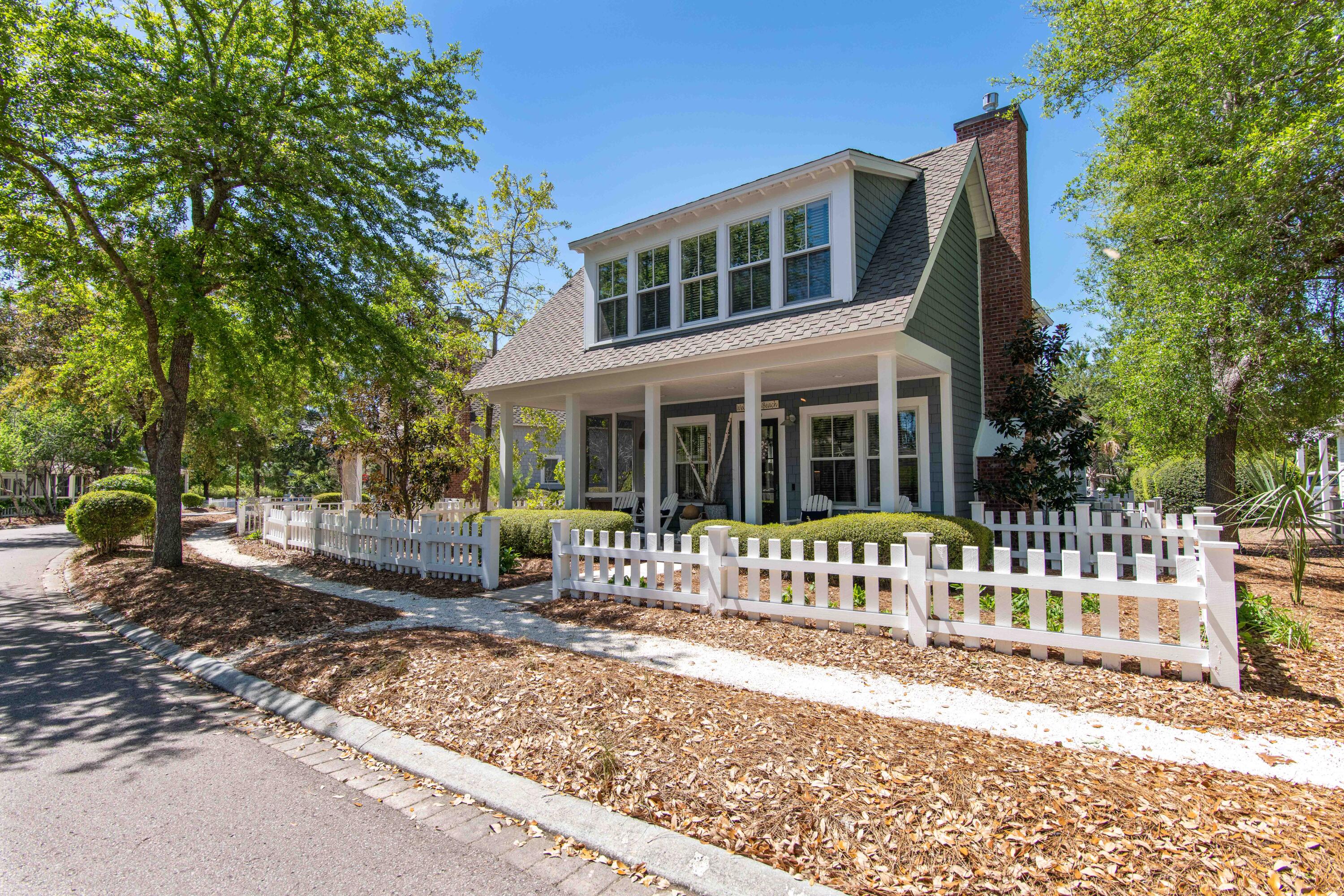Discover the Watersound lifestyle at this charming updated cottage located on coveted Salt Box Lane. Perfectly positioned on one of the largest cottage lots, this home exudes charm and curb appeal. The great room, which features a gas fireplace and vaulted ceilings, boasts lots of natural light and is a perfect gathering space for family and friends. The lovely kitchen is well appointed and includes stainless appliances, white cabinetry, granite counters, and a gorgeous NEW penny tile backsplash. A spacious master bedroom is located on the main level and features vaulted ceilings, new king bed/mattress, two closets, and ensuite bath. Another full bath, built in desk area, and laundry closet with NEW ''smart'' washer and dryer complete the first level.