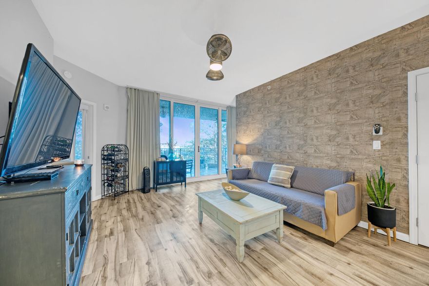 Updated and full 2 bed 2 bath condo located at The Palms and mostly furnished! Updates include new flooring and stainless steel appliances. The Palms HOA Dues Covers - All utilities are included in HOA dues water, sewer, electric, cable, WiFi, phone, trash.  During season a shuttle is available to public beach access.  Amenities include an expansive lagoon pool, children's pool, restaurant and lounge area, covered parking, a luxury spa, fitness/cardio center, lighted tennis courts, basketball court, jogging trail, & parking garage. Great rental investment or primary condo.  This unit was used as a main property and was not on the rental program, but can be a great rental property.  Rental projections available.