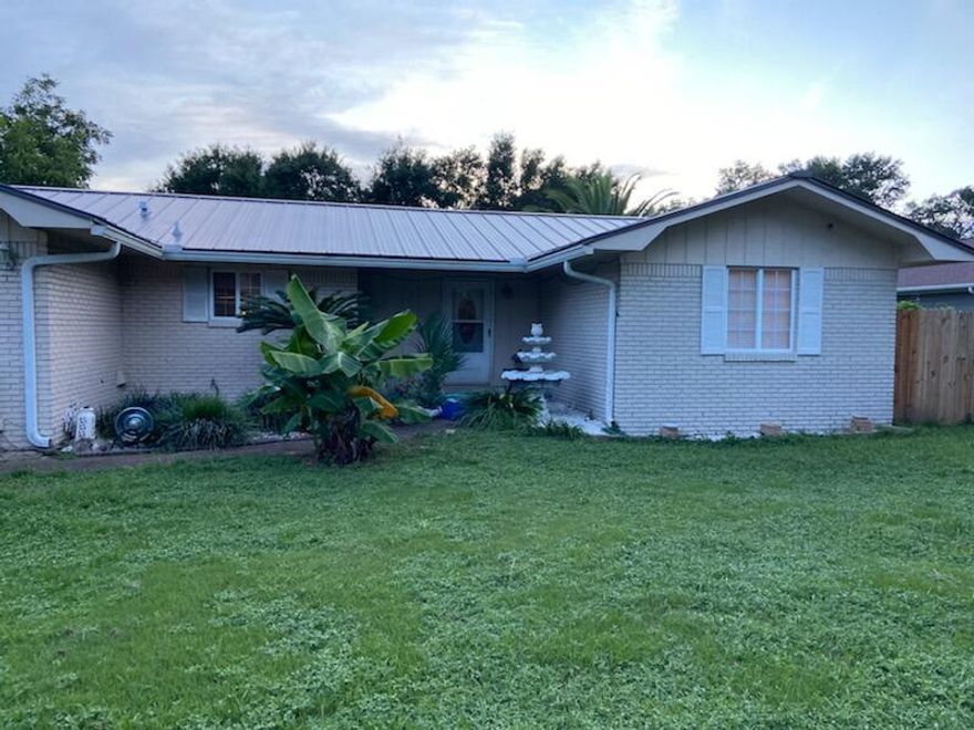 Blows up your Florida Bucket List, Central location to both air fields, Minutes to the Beach, Almost a half acre in the city, Beautiful Mother-In-Law Suite, New inground Pool, Florida Room, Standing Seam Metal Roof, 2 car attached garage plus 2 car detached garage & bonus work space, room for an RV Pad, Fenced back yard, Brick in a growing neighborhood.