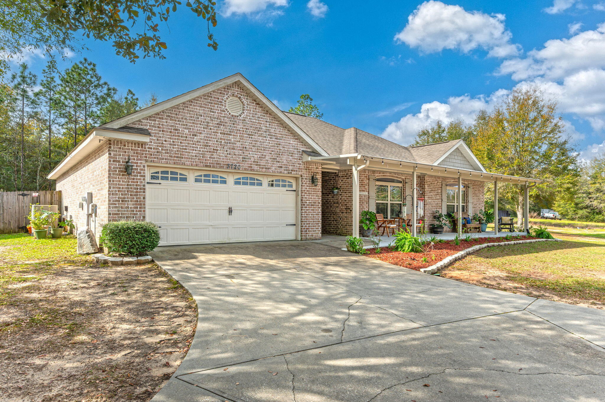 Welcome to this beautifully maintained 4-bedroom, 2-bath home, perfectly situated on a ⅓-acre lot in a desirable neighborhood. From the moment you arrive, you'll appreciate the additional concrete parking space--perfect for multiple vehicles, a boat, or an RV.Step inside to an inviting open-concept living area, where tray ceilings add an elegant touch to the living room, kitchen, and dining spaces. The kitchen is a chef's dream, featuring granite countertops, stainless steel appliances, a large pantry,accent backsplash and custom cabinetry--all designed for both style and functionality.The spacious master suite is a true retreat, complete with a tray ceiling, walk-in closet, and spa-like en-suite bathroom featuring a soaking tub, stand-alone shower with a rainfall showerhead, and dual vanities. Three additional bedrooms provide plenty of space for family, guests, or a home office.
A conveniently located laundry room with two access points makes daily chores a breeze. Step outside to enjoy your fully fenced-in backyard, offering privacy and plenty of room for outdoor activities. The stunning Florida room is the perfect spot to sip your morning coffee or unwind in the evenings.
Don't miss out on this move-in-ready home designed for comfort and entertaining. Schedule your private showing today!