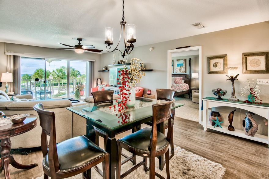 Gorgeous two bedroom, two bath, condo with sweeping views of Amalfi Coast Resorts immaculate grounds, pool and the beautiful Emerald Coast. This unit has a great feel with large rooms, a gulf front master bedroom and built in hallway bunk beds. Fully updated, beach themed unit with new flooring, paint, granite, tile master shower and more. The unit conveys with a deeded parking space ($25k value) and storage locker. If you are looking for a great location, close to everything Destin has to offer along with a low density building, Amalfi Coast Resort is your paradise.