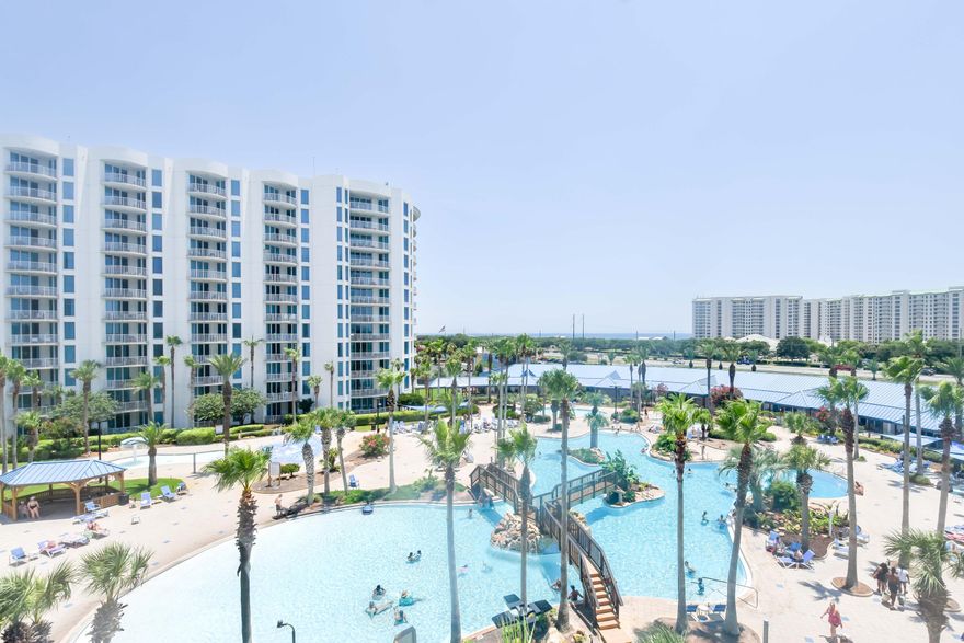 **Rental Machine** This unit is the highest grossing 2 bedroom unit on the Compass Rental Program. The sellers of this pristine condominium have impeccable taste and it shines through on this modern unit. This 5th floor beauty will take your breath away with the recently updated decor, electric shades, and modern lighting. The seamless luxury vinyl flooring throughout lends for a crisp & clean look. This is one of the most sought after floors in the Palms of Destin with a Gulf & pool view available to only a few. The master bedroom allows for a King bed, with sliding doors to the balcony that welcomes one to sip coffee and watch the sunrise. The 2nd bedroom is adorned with a beautiful custom-made bunkbed arrangement with full size beds along with a nearby stackable w/d set up is ideal for renting as it sleeps 8. Main bath has many spray options and LED lighting