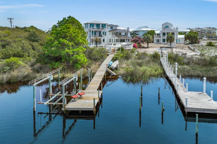 Have the best of both worlds on 30A to include a beach and lake house! Nestled just South of 30A, 'A Villa Lago' is a breathtaking retreat, poised just minutes from the areas renowned turquoise-hued waters and new urbanism communities. Upon initial entry, warm wood tones infuse the foyer with coastal ambience casting an inviting glow over the spacious interiors. The inviting great room with fireplace offers picturesque views of Eastern Lake while the screened in porch beckons for outdoor gatherings. Whether dining al fresco, relaxing by the pool, or enjoying a canoe or paddle board ride, this home offers the ultimate in idyllic coastal living. The gourmet kitchen features custom cabinetry, upgraded granite countertops and a stainless-steel appliance package. The spacious first-floor junior suite with adjacent full bath and laundry complete the first level. Perfectly positioned to take in the extraordinary views of the Eastern Lake outflow into the Gulf, the primary suite lives large offering a seating area and private terrace. The spa-line ensuite offers dual vanities, a soaking tub and walk-in shower. 2 additional junior suites with king size beds (one of which is equipped with private bath) are offered on the far east wing of the home. A bunk room and daybed are offered on the "Crow's Nest" with gorgeous views of Eastern Lake and the Gulf. Make an evening night-cap and step outside to the private covered terrace, the perfect place to admire the mesmerizing hues of the Emerald Coasts sunsets each and every night. The shared dock (with the adjacent homeowner) offers a canoe and kayak launch, seating area and boat lift making lake-living a breeze.

Nestled on the south side of Scenic Highway 30A, the sought-after area of Eastern Lake offers residents with close proximity to the Gulf and State Park, as well as a walking distance to Greenway Park, the "new town center," featuring Wild  Olives, Canopy Road Breakfast Cafe, Turbo Coffee, Local Cantina, Pecan Jacks, Jonah Allen Art Gallery, local boutiques, and State Forest access. With impressive annual revenue projections exceeding $125,000 and no HOA, 34 Beachside Drive is a compelling and rare opportunity for investors and second or full-time residents alike.  Recent notable upgrades to the residence including a newly installed roof in 2025, newer HVAC systems and Water Heaters, a recently painted exterior, and new furnishings. 

Schedule a private viewing today and start living the coastal lifestyle you deserve.