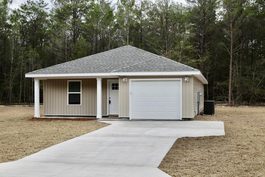 Estimated Completion Date End of July! New Construction 2 bed 2 bath. The home features LVP throughout the home. The kitchen is open to the living room and features an island, stainless steel appliances, white tile backsplash, granite counter tops and an under mount sink, bathrooms also have granite counter tops!  Don't delay and you may be able to pick you colors. Pictures are of a previous 3 bed 2 bath home for illustration purposes and to show color style and quality of build.