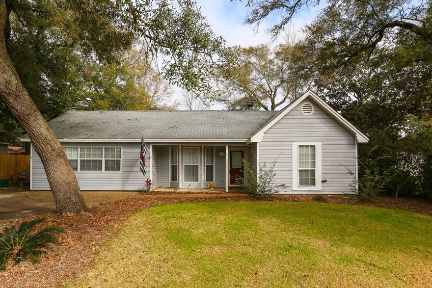 3 Bedroom 2 Bath home centrally located in Niceville. Homes is close too top rated schools and Eglin AFB. There are two large living rooms, one of the living rooms includes a wood burning fireplace with stone accents. The second living room is being used as a theatre room and the seller is including the projector and screen. The kitchen includes a large fridge, gas stove and has a breakfast bar that is open to the separate dining room. The house has a split floor plan with the Master bedroom located on the back of the house. Master bathroom has tile flooring, vanity with cultured marble tops, and a stand up tile shower. The exterior includes a 21 X 17 foot screen porch, an oversized metal storage shed, fenced in back yard, and irrigation for the landscaped yard. This is a must see!