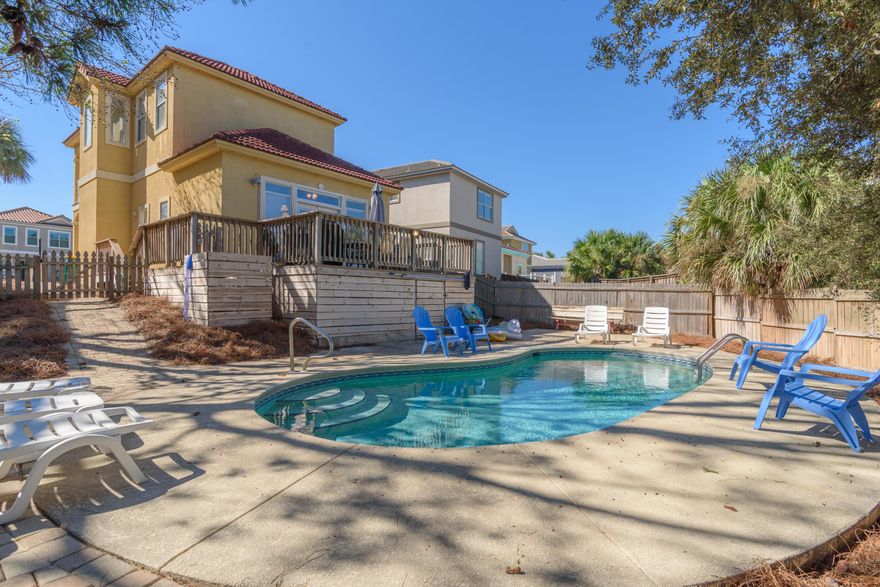 Tuscan Sun is a hidden gem tucked away in the corner of Terra Cotta Terrace with 3 bedrooms, 3 baths 1410 sq ft and its own private pool. This mediterranean style home has an unusually large backyard with a sun deck overlooking the newly resurfaced pool. This vacation rental is sold fully furnished, with golf cart and has produced $60K a year in rental income since 2018. See 'Cost To Own' in documents. See the reviews and bookings on VRBO #4845645 Tuscan Sun. This community has deeded beach access, 2 tennis courts, sand volley ball court, community pool and rec center as part of the HOA. HOA is only $170 per month .These pictures are from 2016 and will be updated with new pics and virtual tour Nov 1st.