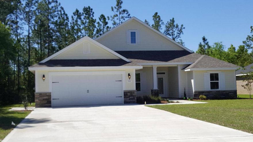 CONSTRUCTION COMPLETE !! Craftsman style 4/3.5 with a 2 car garage on a 1/2 acre lot in The Preserve in Milton! Exterior has stacked stone and hardee plank in front. Open floor plan with large island w/breakfast bar seating. All stainless steel appliances and granite counters in kitchen. 10 foot ceilings , master suite with ensuite that includes double vanities, water closet, a large walk in closet and a beautiful all tile walk in shower with multiple shower heads. Out back is a 12x18 foot covered lanai overlooking the 300 foot deep lot. Call for showing!!