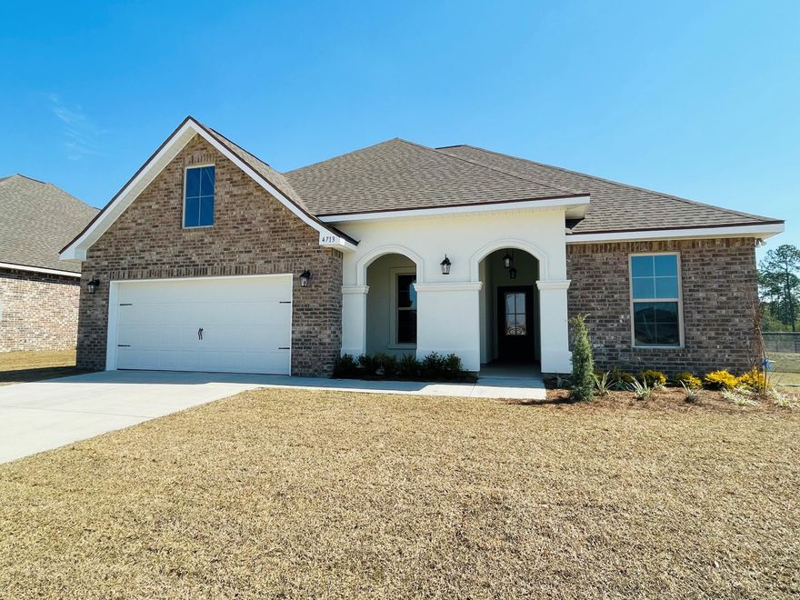 Located on a corner lot, the HICKORY III A in Patriot Ridge community offers a 5 bedroom, 3 full bathroom, open design. Upgrades added (list attached).Features: double vanity, garden tub, separate shower, and walk-in closet in master suite, double vanity in all other bathrooms, den, formal dining room, kitchen island, walk-in pantry, covered front and rear porches, boot bench at garage entry, recessed lighting, crown molding, ceiling fans in living room and master bedroom, smoke and carbon monoxide detectors, landscaping, architectural 30-year shingles, flood lights, and more!Energy Efficient Features:  electric water heater, a kitchen appliance package with a electric range, vinyl low E MI windows, and more!