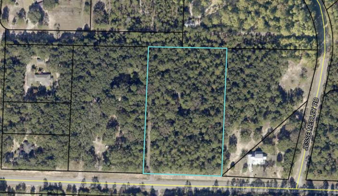 Wow! Here you go! over 4 acres great location! This peropery already has a driveway paved! Water meter is in place! Power is in plus there's a power pole already.There is a mobile home on the property and a garage. We are giving no value to the garage or home. There's no access to either they're in rough shape. Buying will be ''AS IS''