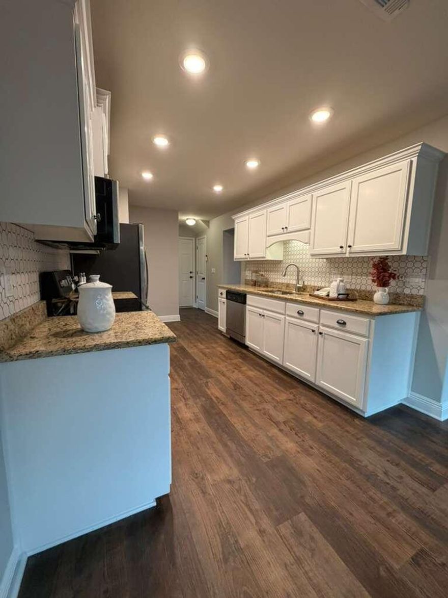 Professional Photos Soon! New Appliance Package On Order- 2018 4 Bedroom 2.5 baths. This beautifully maintained 2018 Home, freshly painted home shows like a model and is only a few years old, located in the desirable Natures Way community. The first floor features high-end laminate flooring and a stylish kitchen with granite countertops, tile backsplash, and stainless steel appliances. The bright dining area flows into a spacious family room with large windows overlooking the private backyard.Upstairs, the impressive primary suite includes tray ceilings, a garden tub, double sinks, and a walk-in closet. Three additional bedrooms, a full bath, and a convenient laundry area complete the second floor.Enjoy the outdoors on the nicely sized patio with peaceful wooded views