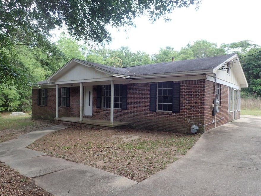 Located in the very heart of Milton, this REO home rests on just over 2 acres and is walking distance to shopping, city municipalities, and college. Home was built in 1970 and has 3 bedrooms and 2 baths. Home needs repairs therefore will not qualify for most financing, but talk about potential! Home has all brick exterior, screened porch, indoor laundry and large fireplace. A must see to appreciate! Call today!