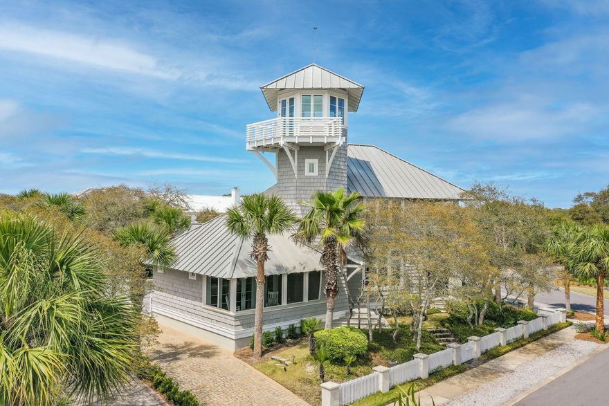 CURRENTLY UNDER CONTRACT, SELLER ACCEPTING BACKUP OFFERS. Designed by the award-winning Dungan Nequette architecture team, the home has been featured in Atlanta Homes and Coastal Living magazines, and highlighted twice on HGTV. The stunning unique design of this nautical beach home is welcoming and serene. Outside, you'll first notice the beautifully manicured landscaping. Once inside, you're greeted by the custom design of the carefully crafted hardwood flooring and an eye-catching 3 story spiral staircase. Ideally situated adjacent to the iconic Carillon Bell Tower, from the top floor you have panoramic views of the picturesque community and bell tower. Gulf views are rare in Carillon, but this home's lookout tower provides a beach facing balcony for you to enjoy the Florida sun.