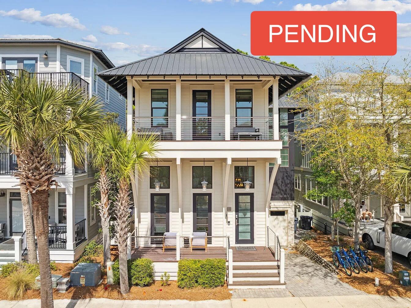 This stunning 30A dream home has been custom-built to host an extraordinary experience at the beach. Conveying fully-furnished, this exceptional getaway can be a lucrative investment property with rental projections at $150K annually. Located in the heart of Seacrest Beach, this property presents a wonderful floor plan with five bedrooms, a home gym, two separate living rooms and multiple levels of outdoor living spaces. This beautifully designed home flaunts a summer kitchen on the first floor, luxury pizza oven on the second floor balcony, and gas fireplace on the third floor balcony. The meticulously-curated interior has hardwood floors, large transom windows and unique floating stairs. The well-appointed chef's kitchen is equipped with double Fisher Paykel refrigerators, durable granite countertops, a 48 inch Thermador gas range, and an oversized pantry. The main living room showcases nano doors leading out to a rare two-story atrium. The living room is furnished with modern seating along with a beautiful fireplace and wood mantel. The entrance to the home displays an airy foyer which is adjacent to a primary bedroom with an ensuite bathroom. The ground level features a massive guest bedroom, custom built-in bunk beds and a gorgeous home gym filled with natural light. This ground level has a spacious living room with access to the screened-in summer kitchen. The top floor has two primary suites with vaulted ceilings, a fully-equipped laundry room and a breathtaking screened-in balcony. The home is offered fully-furnished and rental-ready. Inquire to receive rental income information and estimated expenses for this Seacrest Beach dream escape!