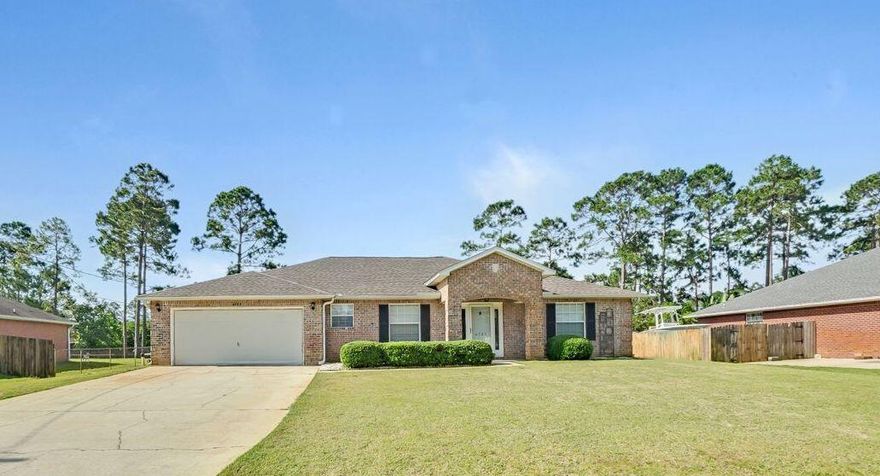 Beautiful all one level brick home located in the sought-after Holley By The Sea neighborhood. The split floor plan includes two living spaces and two dining spaces, open floor plan with oversized island and breakfast bar in the kitchen. Tile floors throughout the living areas and carpet in the bedrooms. Roof was replaced in 2019, Water Heater in late 2017, and AC was replaced in 2018. Current owners added a huge 33x16 concrete patio perfect for outdoor living/grilling and entertaining. The lot is just under a HALF ACRE so there is plenty of room to add a pool, playground, or whatever your heart desires. Other features of the home is no popcorn ceilings, stainless steel appliances, and a fresh new coat of neutral paint throughout. Holley By The Sea offers tons of amenities including a lap