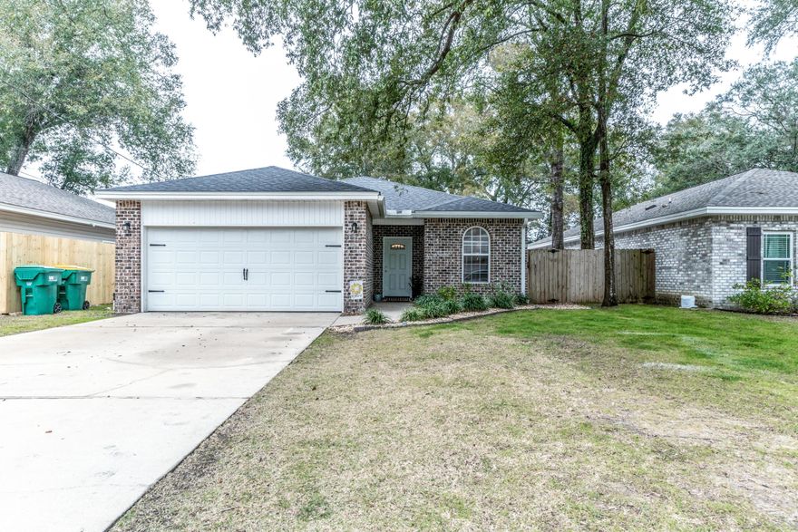 Centrally located, cute as a button brick/vinyl 3 bedroom, 2 bath home. Home features just over 1,400 square feet of living space with a screened-in porch. Lots of character with this open space design, barn doors, laminate flooring in living areas and bedrooms, tile in wet areas and hallways. Lots of natural light and warm, neutral colors throughout the home. Stainless appliances in the kitchen with granite counter tops. Home has been lovingly maintained and is ready for its new owner. Bedrooms 2 and 3 share a bathroom just off of the dining/living space. Laundry is inside and is tucked away near bedrooms 2 and 3. There is a flex room which could be an office or playroom off of the living area and right outside of the screened porch.